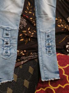 Light Wash Jeans with Button Detail