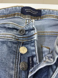 Distressed Denim Jeans