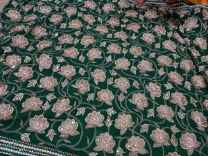Green Embroidery Saree With Blouse.
