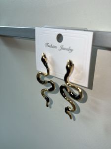 Gold And Black snake Earring