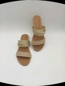 Tan And Gold Flat Sandals.