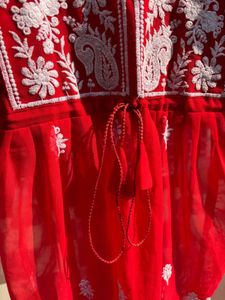 A beautiful red chikankari short kurti