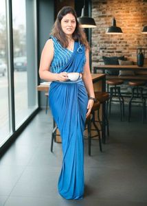 Elegant Blue Sleeveless Saree with stiched blouse.