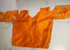 Orange  Blouse With Peacock Green Lehenga
