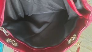 Red Quilted Handbag with Gold Detail