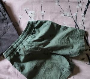 Two Boys Orange and green Shorts