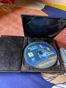 PS2 With Controller And Two Game Cds