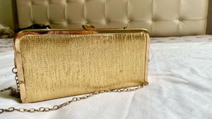 Elegant Gold Floral Embellished Clutch