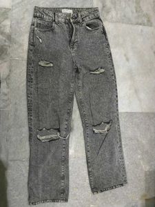 Straight legged ripped jeans