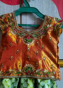 A Maggam Blouse With Beautiful Pattu Langa