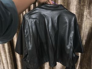 Elbow cut leather jacket.