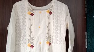 Off White Anarkali Gown Perfect For Your Holi