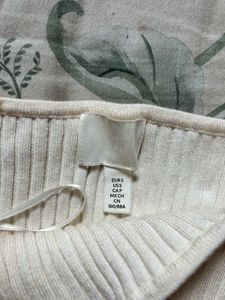 H&amp;M ribbed knit boat neck top .