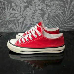 Red Low-Top Canvas Sneakers.