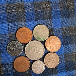 8 Coins Of Different Foreign Countries