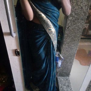 Elegant Teal Saree with Paisley Border