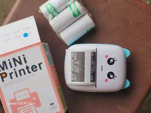 Mini Printer With 4 Sticky Rolls New Condition