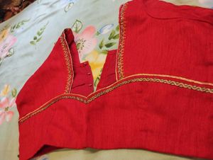 Elegant Red Saree with Gold Embroidery