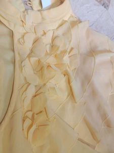 Yellow Sleeveless Ruffle Top