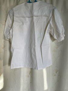 white top with collar