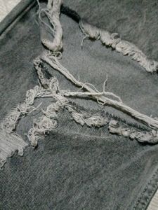 Ripped grey jeans