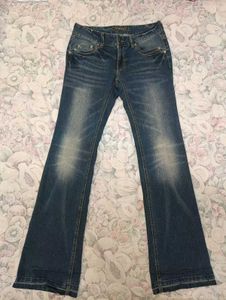 Thrifted 90s flared denim.