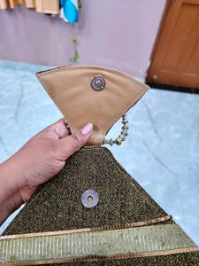 Unique Triangular Clutch