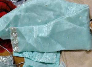 Elegant party organza saree With Stitched Blouse