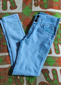 Light Blue High-Waisted Jeans And Bule Top