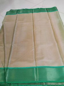 Elegant light orange &amp; Green Saree