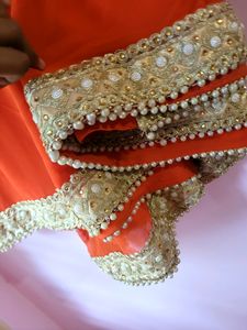 Orange Georgette Saree With 2  Worked Gold Blouse