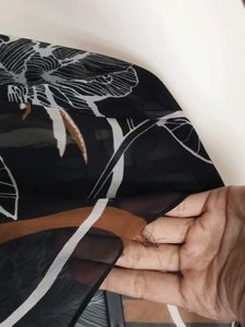 Branded floral sheer top with attached camisole