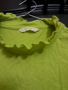 Vintage Sleeveless Ruffle Mock Neck Top