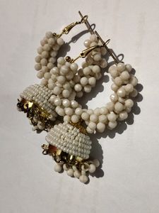 A Plastic Work Jhumka With Whitish Colour