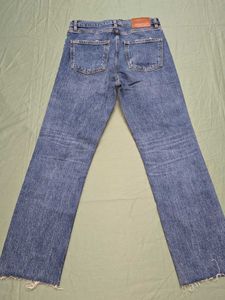 ZARA Ripped Knee Jeans