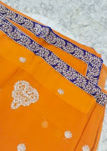 Beautiful saree..small border.1 time used..30min