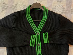 Black Sweater With Green Margins