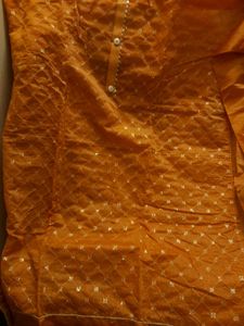 Unstitched Orange Suit
