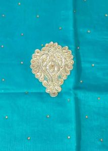 Teal Saree with Gold Embellishments