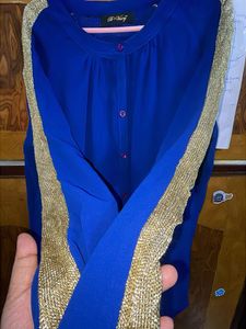 Full Sleeve Blue Top with Gold Detail In Hands