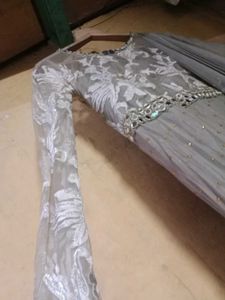 Elegant Grey Embroidered Gown for Festive Occasion
