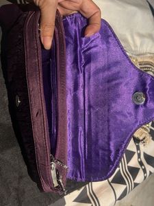 Elegant Purple Feathered Clutch