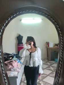 Embroidered Peplum Top