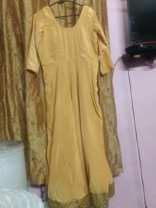 GOWN OR FROCK SUIT