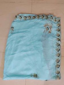 Cinon Fabric Cyan Colour Saree Without Blouse