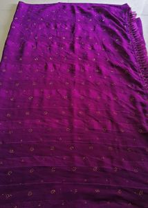 Purple saree with designer blouse