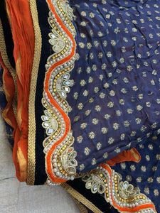 Elegant nevy blue and orange saree