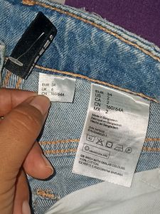 RIPPED DENIM JEANS