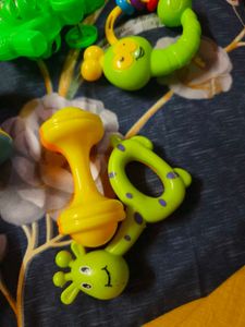8 new born rattles