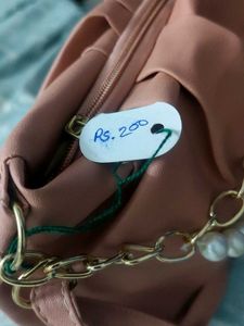 Stylish Pink Handbag with Chain Detail